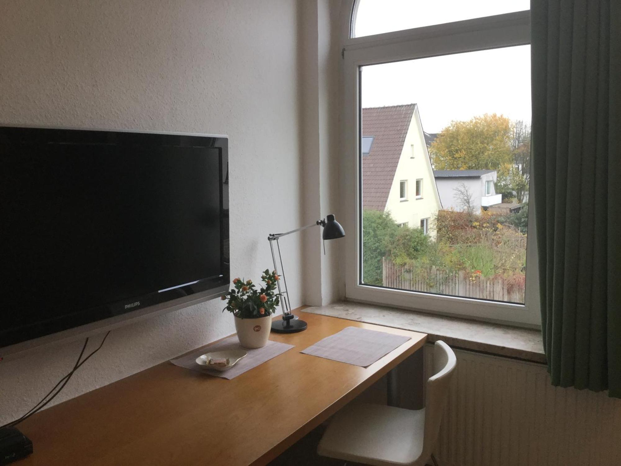 Ferienhaus Us lütt Hus und das Zimmer Linde im Haupthaus Oldenburg Habitación foto